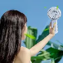 Holding-Fan-Portable-2.webp